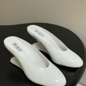 Alaia Curve Wedge Mules